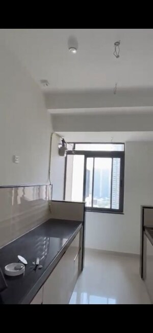 Kitchen in 2 BHK Apartment at Dynamix Divum, Malad East – for Rent