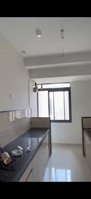 Kitchen in 2 BHK Apartment at Dynamix Divum, Malad East – for Rent
