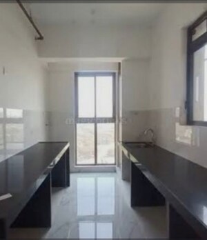 Kitchen in 5 BHK Apartment at Damji Shamji Mahavir Spring Tulip Phase 1, Pokhran Road No Two – for Sale