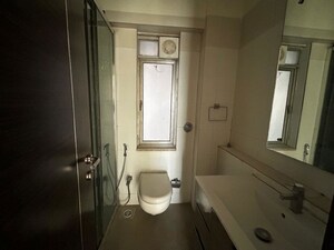 Bathroom in 1 BHK Apartment at Raunak Unnathi Woods, Ghodbunder Road – for Rent