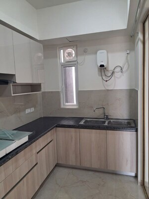 Kitchen in 3.5 BHK Apartment at Smart World Orchard, Sector 61 – for Rent