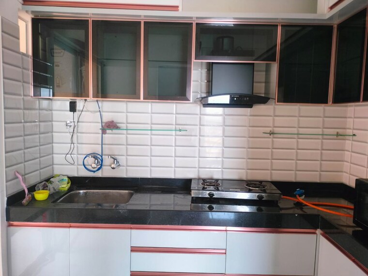 Kitchen, nyati-era 2 Bedroom 1000 Sq.Ft. Apartment In Dhanori Pune 10349133