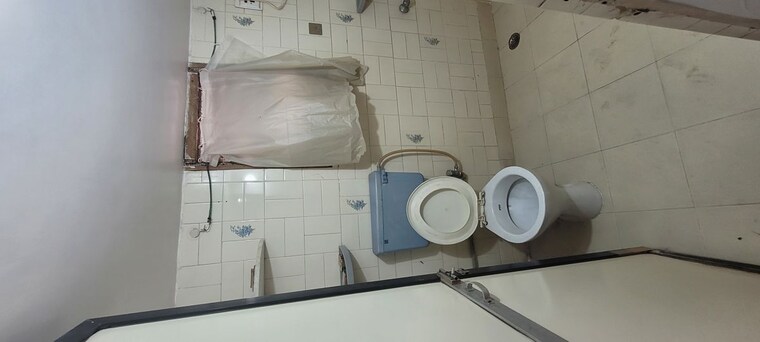 Bathroom, green-wood-complex-manpada 1 Bedroom 618 Sq.Ft. Apartment In Manpada Thane 10349156