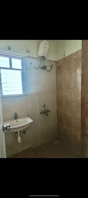 Bathroom in 2 BHK Apartment at Manav Silver Skyscapes, Wakad – for Rent