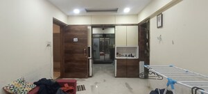 Living Room in 1 BHK Apartment at Baba Solitaire, Vashi Sector 26 – for Rent