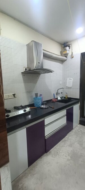 Kitchen in 1 BHK Apartment at Baba Solitaire, Vashi Sector 26 – for Rent