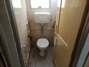 Bathroom in 1 BHK Apartment at Nagari Niwara CHS, Goregaon East – for Rent