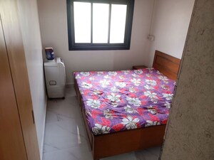Bedroom in 1 BHK Apartment at Nagari Niwara CHS, Goregaon East – for Rent