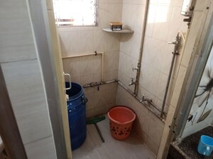 Bathroom in 1 BHK Apartment at Nagari Niwara CHS, Goregaon East – for Rent