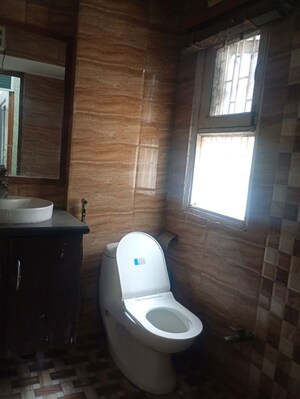 Bathroom in 3 BHK Apartment at Sector 12 Dwarka – for Rent