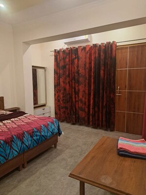 Bedroom in 3 BHK Builder Floor at JakhaN-Rajpur Road – for Rent