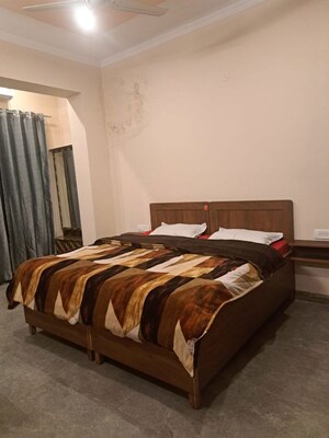 Bedroom in 3 BHK Builder Floor at JakhaN-Rajpur Road – for Rent