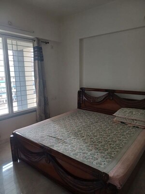 Bedroom in 2 BHK Apartment at RR Lunkad 66 Avenue, Pimple Nilakh – for Rent