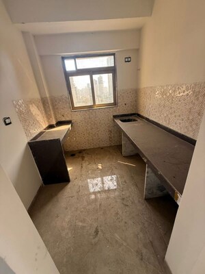 Kitchen in 2 BHK Apartment at New Sai Niketan, Mazgaon – for Sale