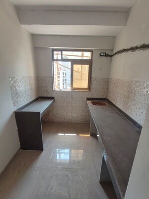 Kitchen in 2 BHK Apartment at ISD Maple Heights, Agripada – for Sale