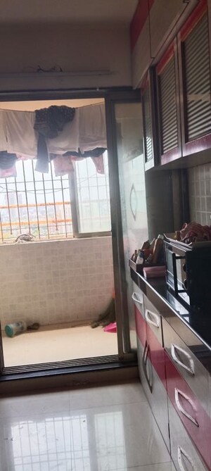 Kitchen in 2 BHK Apartment at Juhu Abhishek Chs Ltd, Andheri West – for Sale