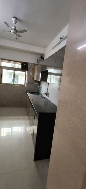 Kitchen in 2 BHK Apartment at Kabra Paradise, Andheri West – for Sale