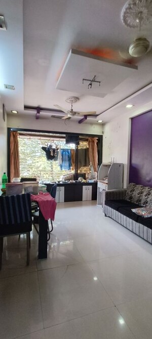 Living Room in 1 BHK Apartment at Aashirwad CHS, Borivali West – for Rent