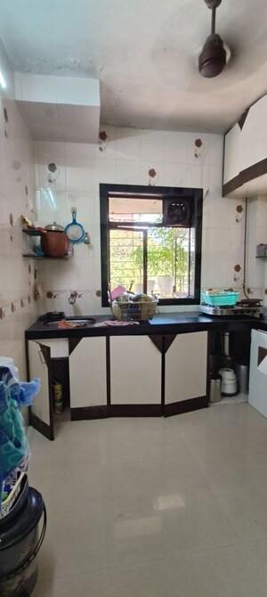 Kitchen in 1 BHK Apartment at Aashirwad CHS, Borivali West – for Rent