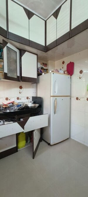 Kitchen in 1 BHK Apartment at Aashirwad CHS, Borivali West – for Rent