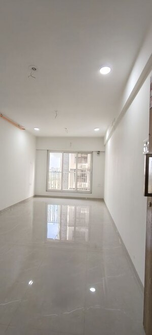 Building Lobby in 2 BHK Apartment at Zee Ashtavinayak, Andheri West – for Sale