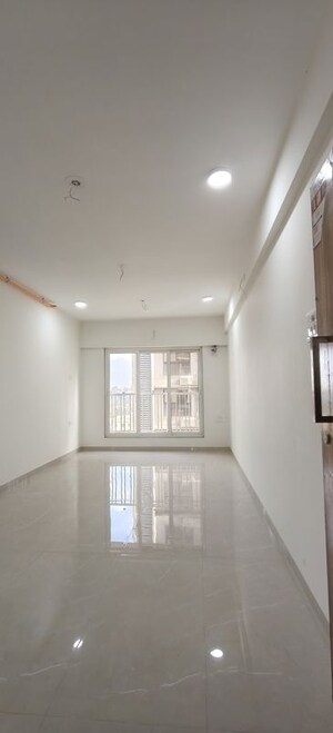 Building Lobby in 2 BHK Apartment at Zee Ashtavinayak, Andheri West – for Sale