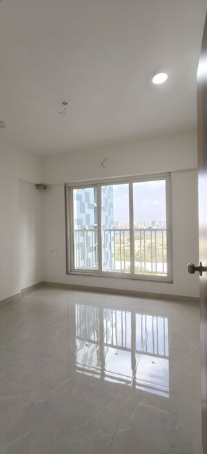 Room in 2 BHK Apartment at Zee Ashtavinayak, Andheri West – for Sale
