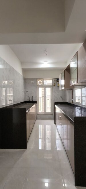 Kitchen in 2 BHK Apartment at Zee Ashtavinayak, Andheri West – for Sale