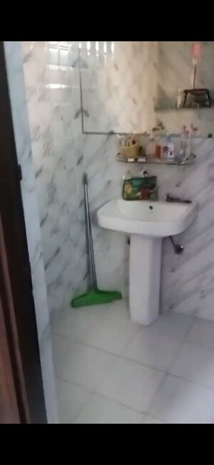 Bathroom in 3 BHK Apartment at Gaurs Cascades, Raj Nagar Extension – for Rent