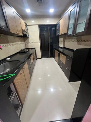 Kitchen in 2 BHK Apartment at Jaydeep Park, Majiwada – for Rent