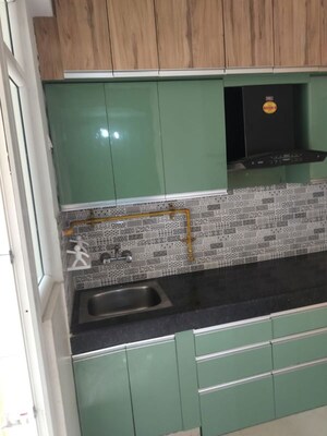 Kitchen in 2 BHK Apartment at Nilaya Greens, Raj Nagar Extension – for Rent