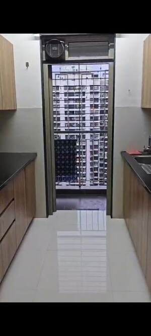 Kitchen in 2 BHK Apartment at Lodha Splendora, Ghodbunder Road – for Rent