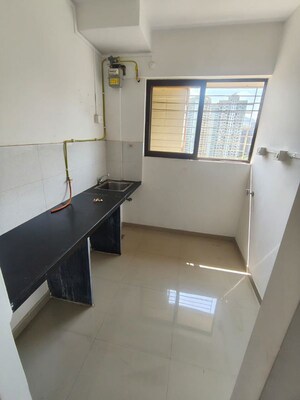 Kitchen in 1 BHK Apartment at Raymond Aashiyana, Vartak Nagar – for Rent