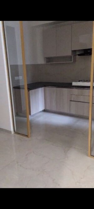 Kitchen in 2 BHK Apartment at Smart World Orchard, Sector 61 – for Rent