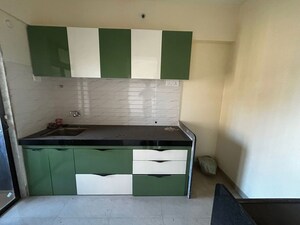 Kitchen in 3 BHK Apartment at Ashish Parkwoods, Ghodbunder Road – for Rent