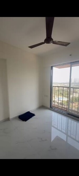 Bedroom in 1 BHK Apartment at Metropolis Bayside, Kasarvadavali – for Rent