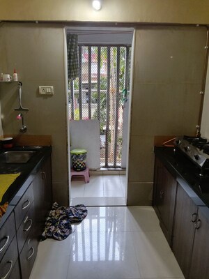 Kitchen in 2 BHK Apartment at Daze Apartment, Malad West – for Rent