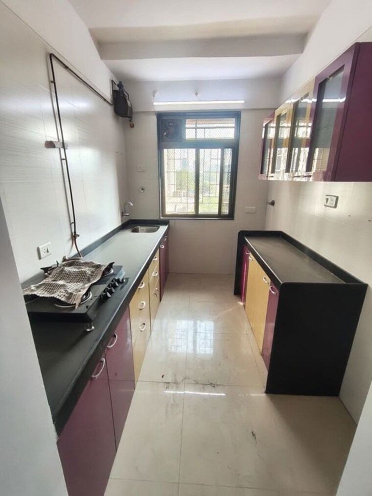Kitchen, sheth-vasant-athena 2 Bedroom 700 Sq.Ft. Apartment In Laxmi Nagar Thane 10349821