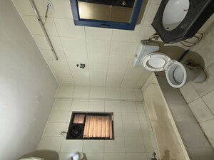 Bathroom in 2 BHK Apartment at Mittal ParkWayz, Wakad – for Rent