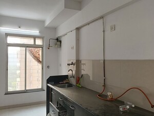 Kitchen in 2 BHK Apartment at Puranik City, Kasarvadavali – for Rent