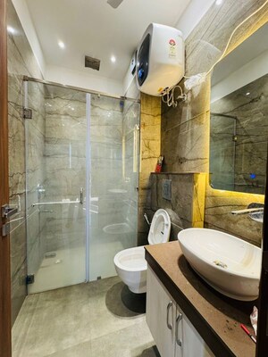 Bathroom in 3 BHK Builder Floor at Ansal Sushant Lok I, Sector 43 – for Rent
