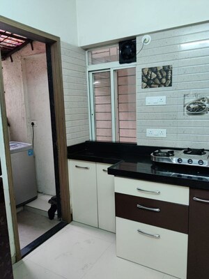 Kitchen in 3 BHK Apartment at Adi Skyline Apartments, Wakad – for Rent