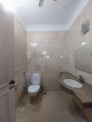 Bathroom in 3 BHK Builder Floor at Defence Colony – for Rent