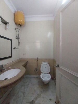 Bathroom in 3 BHK Builder Floor at Defence Colony – for Rent