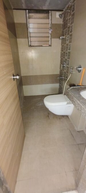 Bathroom in 1 BHK Apartment at Delta Vrindavan, Mira Road – for Rent