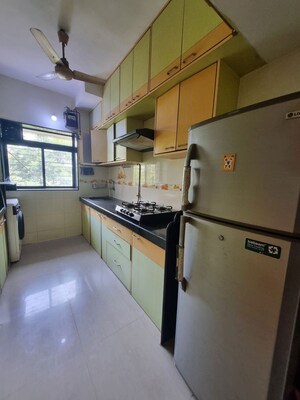 Kitchen in 2 BHK Apartment at Raheja Complex, Malad East – for Rent