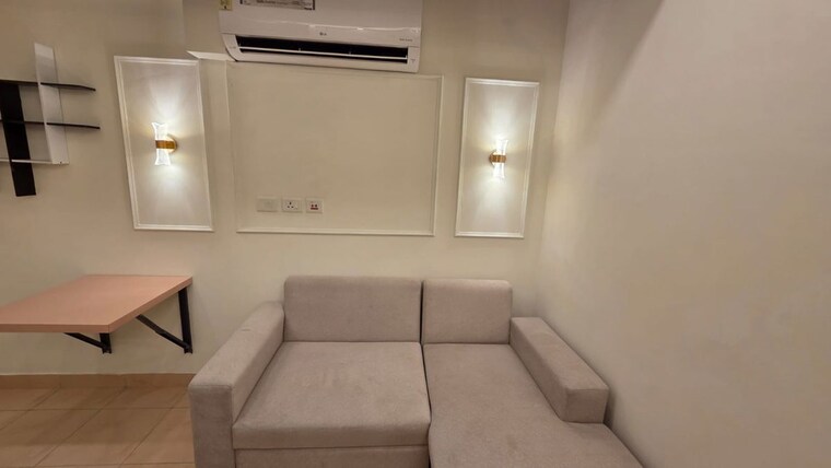 Living Room, bengal-peerless-avidipta 2 Bedroom 550 Sq.Ft. Apartment In Em Bypass Kolkata 10350186