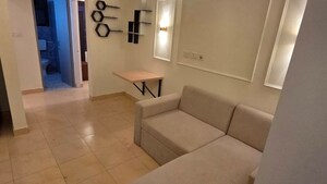 Living Room in 2 BHK Apartment at Bengal Peerless Avidipta, Em Bypass – for Rent