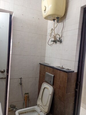 Bathroom in 3 BHK Apartment at Sector 7 Dwarka – for Rent