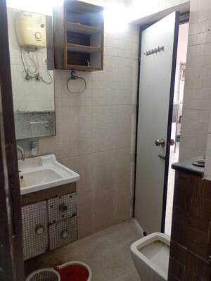 Bathroom in 3 BHK Apartment at Sector 7 Dwarka – for Rent